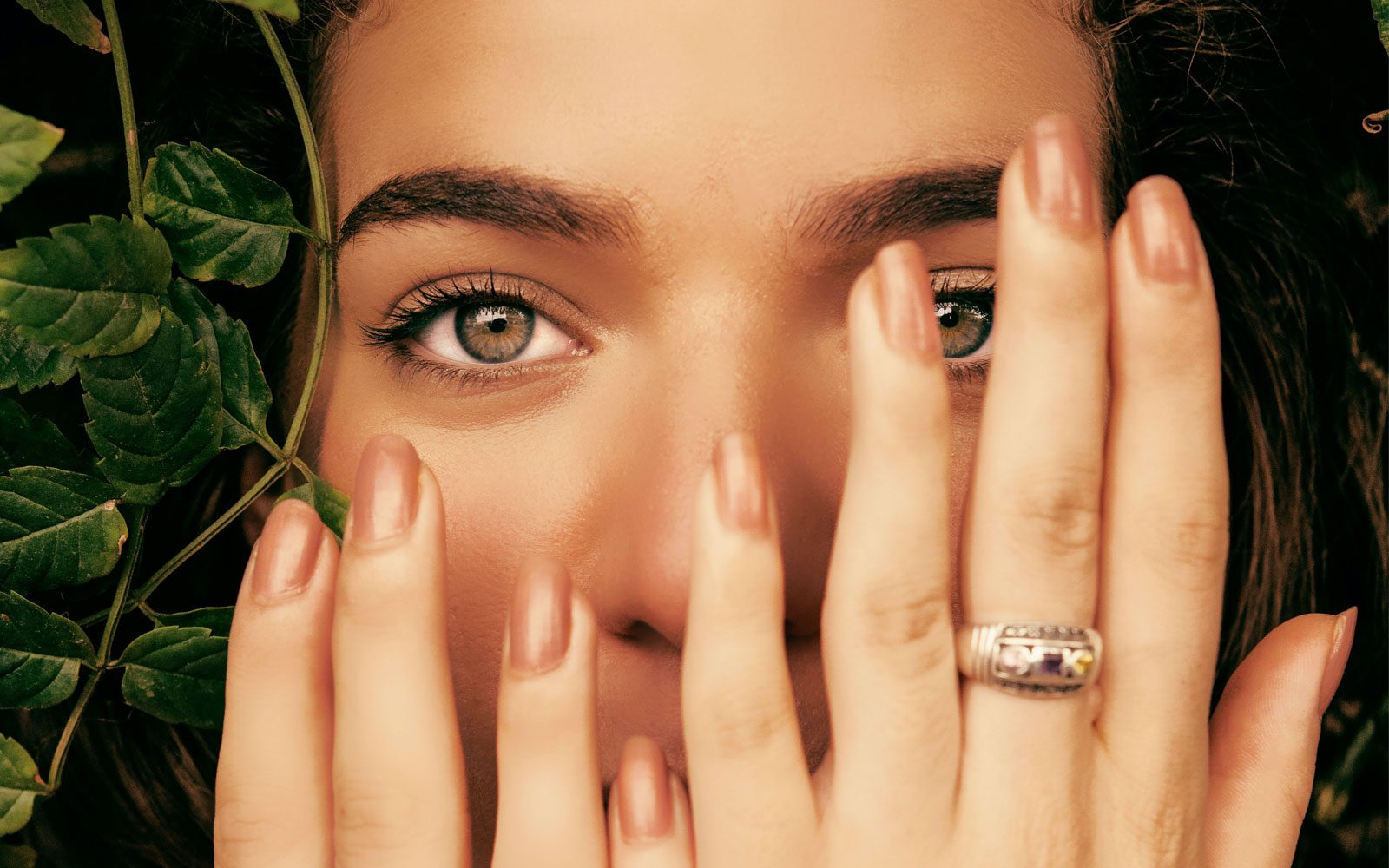 Woman posing with beautiful nails